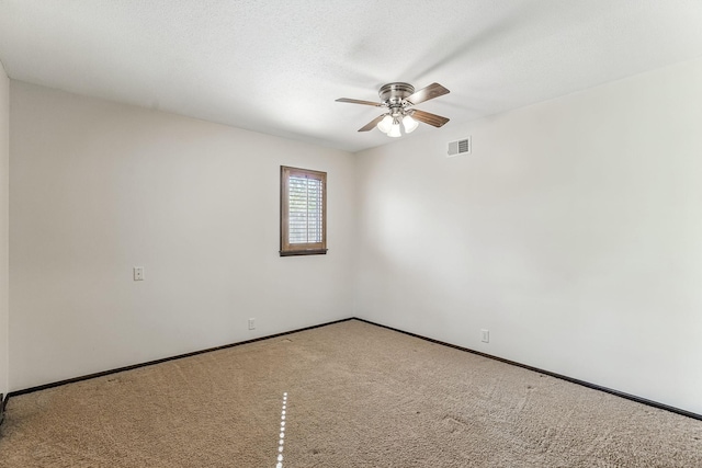 5411 Southwood Dr, Bloomington, MN 55437 - carpeted empty room featuring ceiling fan, visible vents, and baseboards