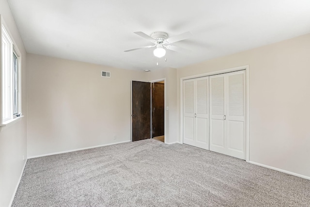 5411 Southwood Dr, Bloomington, MN 55437 - unfurnished bedroom featuring a ceiling fan, visible vents, baseboards, a closet, and carpet