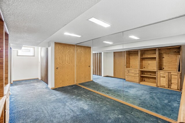 5411 Southwood Dr, Bloomington, MN 55437 - finished basement with carpet and a textured ceiling