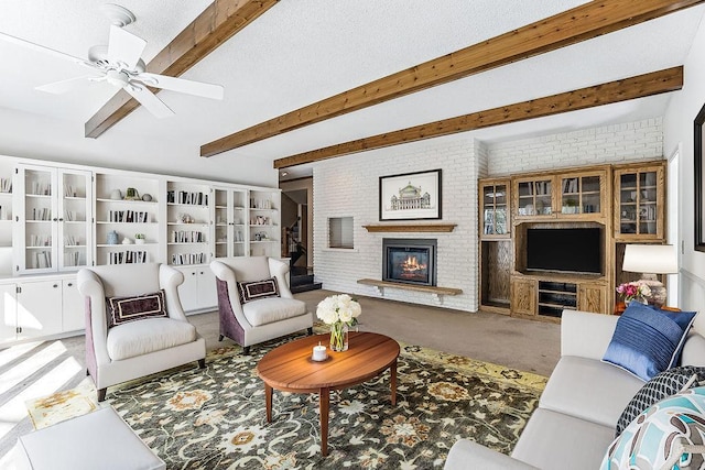 5411 Southwood Dr, Bloomington, MN 55437 - carpeted living room featuring ceiling fan, brick wall, a fireplace, and beamed ceiling