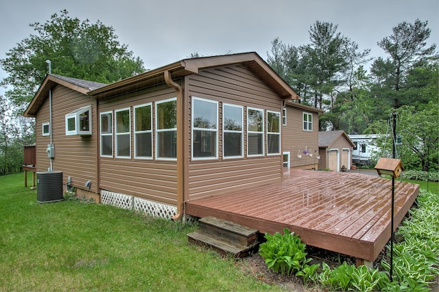895 334th Ave NE, Cambridge, MN 55008 - rear view of property with a wooden deck and a lawn