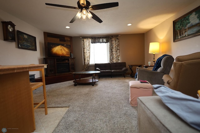 living area with recessed lighting and ceiling fan