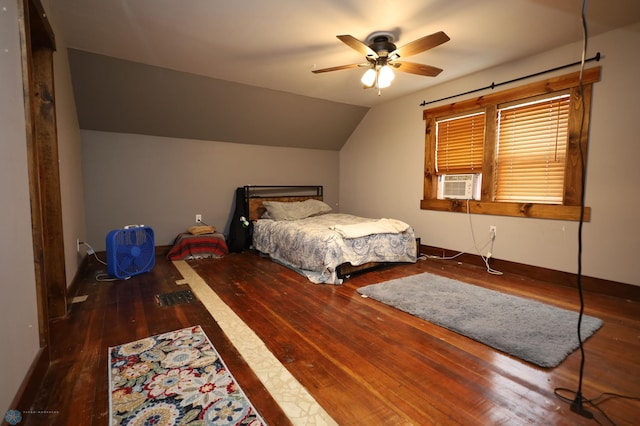 bedroom featuring wood-type flooring, vaulted ceiling, baseboards, and ceiling fan
