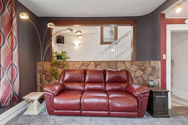 living room with baseboards and wood finished floors