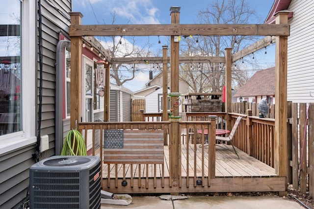 deck with fence and cooling unit