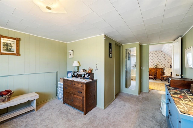 hallway with light colored carpet