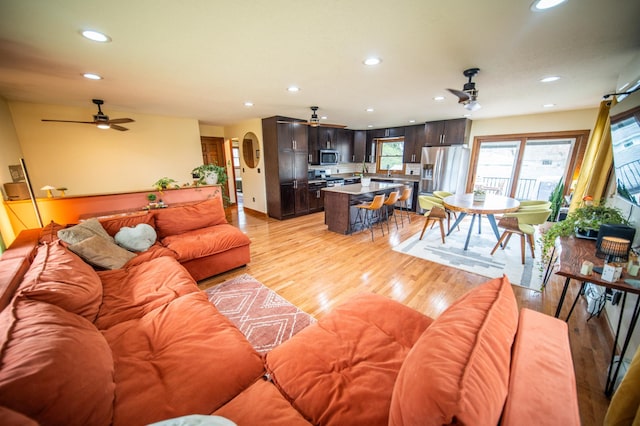 1474 Aldrich Ct, Faribault, MN 55021 - living area with light wood-style floors, ceiling fan, and recessed lighting