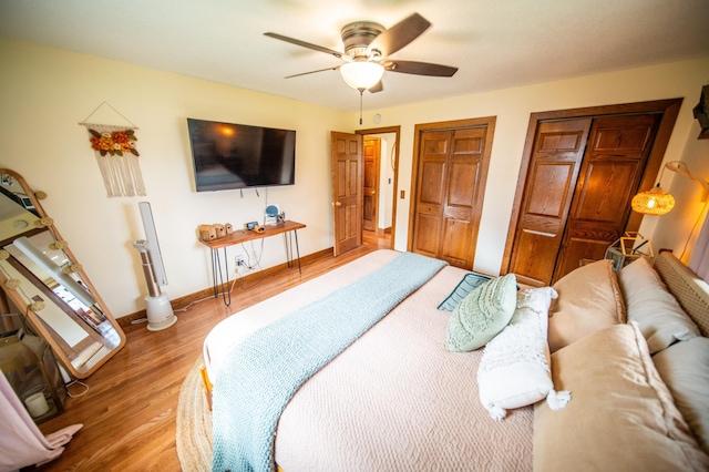 1474 Aldrich Ct, Faribault, MN 55021 - bedroom featuring ceiling fan, baseboards, multiple closets, and wood finished floors