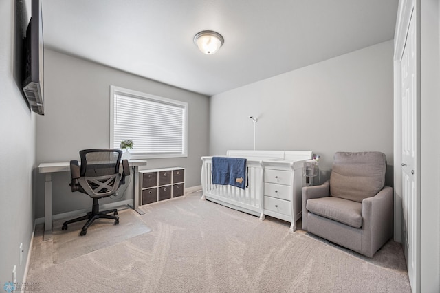 carpeted bedroom with baseboards