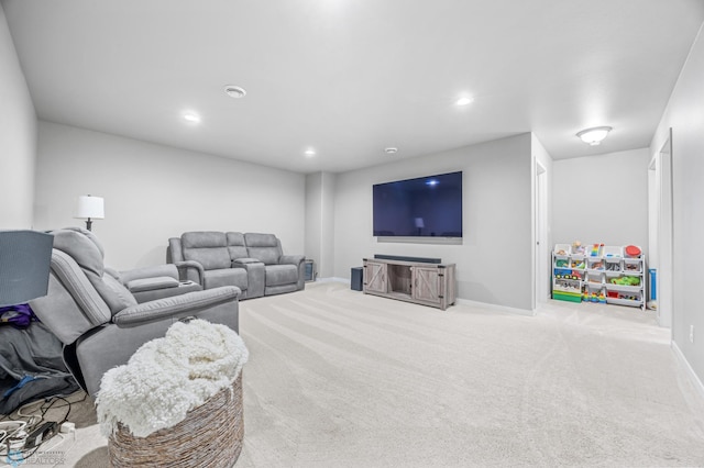 living room featuring carpet, recessed lighting, and baseboards