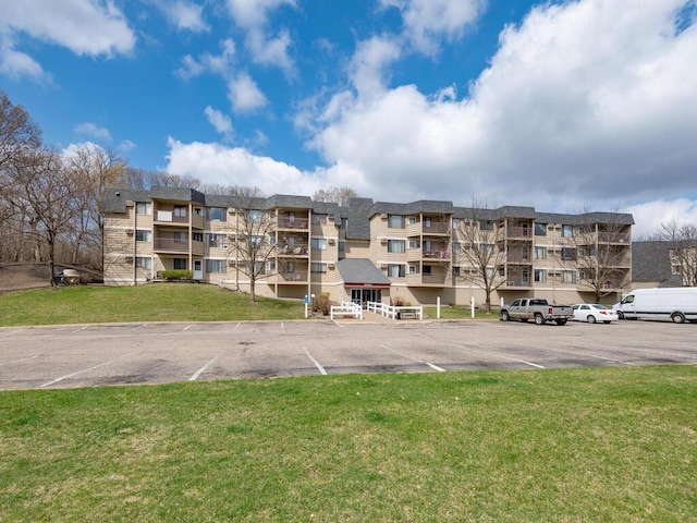 4001 Heritage Hills Dr Unit 105, Bloomington, MN 55437 - view of building exterior featuring uncovered parking