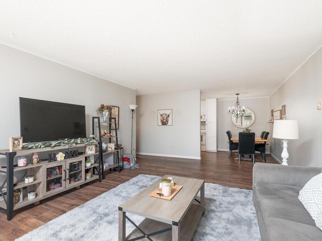 4001 Heritage Hills Dr Unit 105, Bloomington, MN 55437 - living room with wood finished floors, baseboards, and an inviting chandelier
