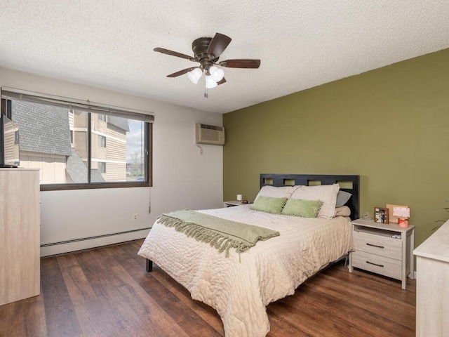 4001 Heritage Hills Dr Unit 105, Bloomington, MN 55437 - bedroom featuring a baseboard heating unit, a ceiling fan, a wall mounted air conditioner, and wood finished floors