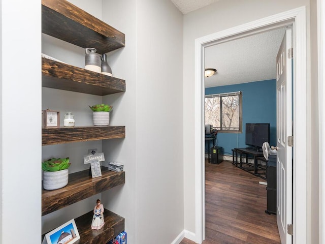4001 Heritage Hills Dr Unit 105, Bloomington, MN 55437 - corridor with baseboards, a textured ceiling, and dark wood-style floors