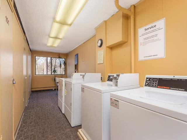 4001 Heritage Hills Dr Unit 105, Bloomington, MN 55437 - shared laundry area with a baseboard heating unit, baseboards, dark colored carpet, and independent washer and dryer