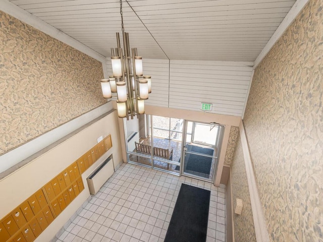 4001 Heritage Hills Dr Unit 105, Bloomington, MN 55437 - interior space featuring wallpapered walls, a chandelier, and light tile patterned flooring