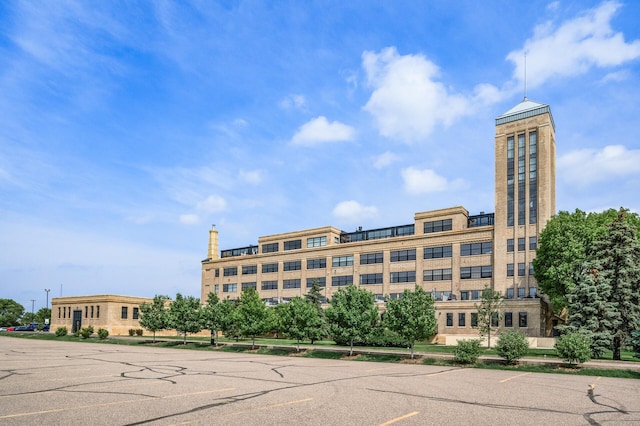 730 Stinson Blvd Unit 504, Minneapolis, MN 55413 - view of building exterior featuring uncovered parking