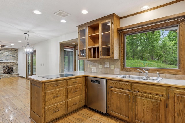 13982 Mount Ter, Minnetonka, MN 55345 - kitchen featuring dishwasher, a sink, black electric stovetop, a peninsula, and brown cabinets