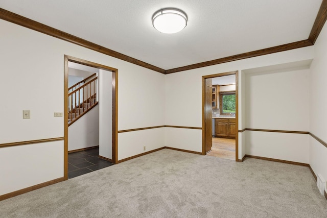 13982 Mount Ter, Minnetonka, MN 55345 - unfurnished room with carpet flooring, ornamental molding, baseboards, and stairs