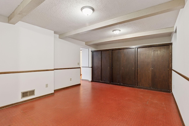 13982 Mount Ter, Minnetonka, MN 55345 - basement with baseboards and a textured ceiling
