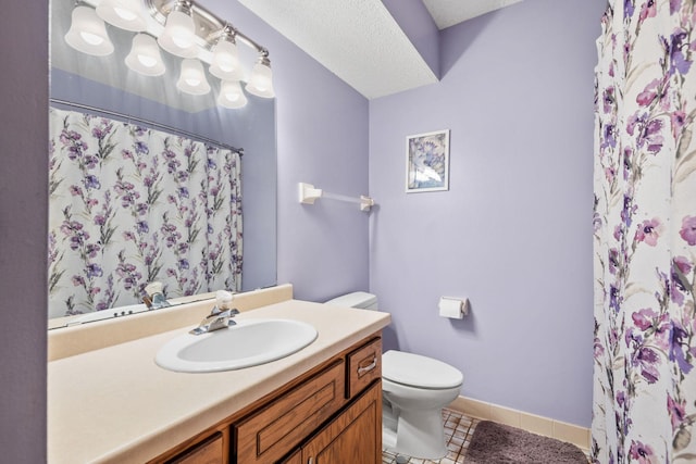 bathroom with toilet, tile patterned floors, vanity, curtained shower, and baseboards