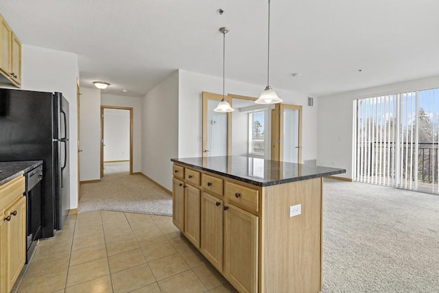 1502 5th St N Unit 401, Hopkins, MN 55305 - kitchen with dark stone counters, baseboards, light colored carpet, and a center island