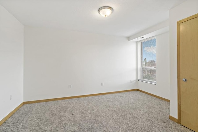 1502 5th St N Unit 401, Hopkins, MN 55305 - unfurnished room with baseboards and carpet