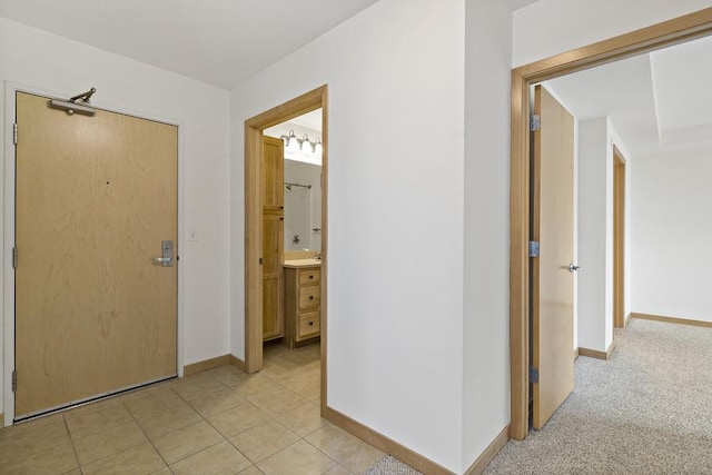 1502 5th St N Unit 401, Hopkins, MN 55305 - hall with baseboards and light tile patterned floors
