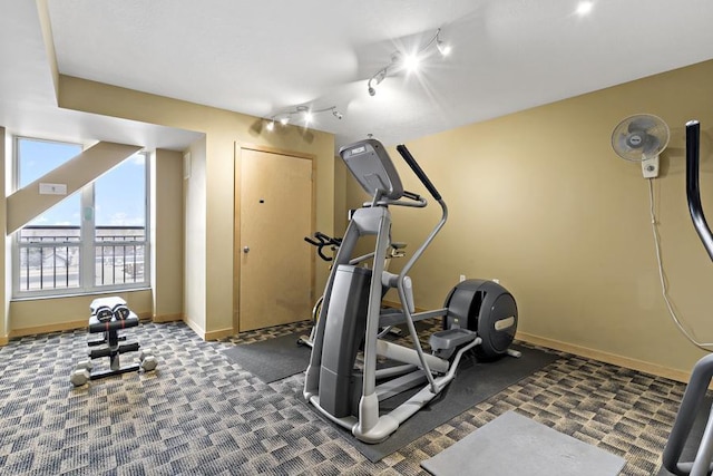 1502 5th St N Unit 401, Hopkins, MN 55305 - workout room with baseboards, carpet, and rail lighting