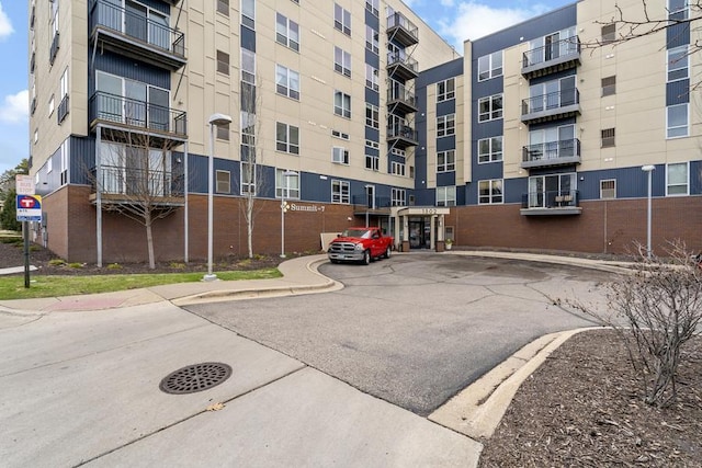 1502 5th St N Unit 401, Hopkins, MN 55305 - exterior space with uncovered parking