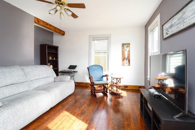 living room featuring a wealth of natural light, a ceiling fan, hardwood / wood-style floors, and baseboards