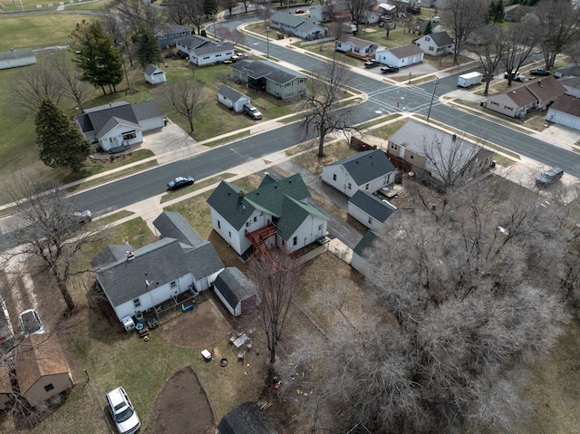 birds eye view of property with a residential view