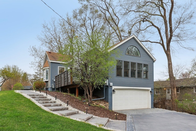 ranch-style home with an attached garage, driveway, and a front yard