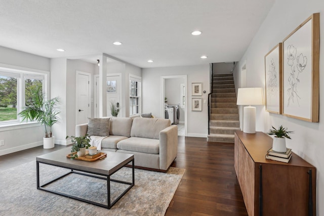 living area with separate washer and dryer, recessed lighting, stairs, and baseboards