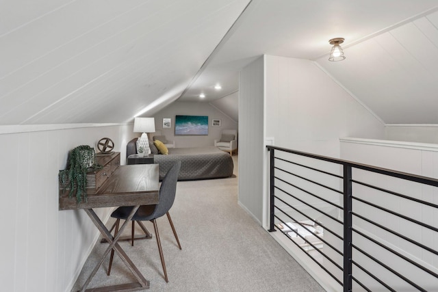 bedroom featuring carpet and lofted ceiling