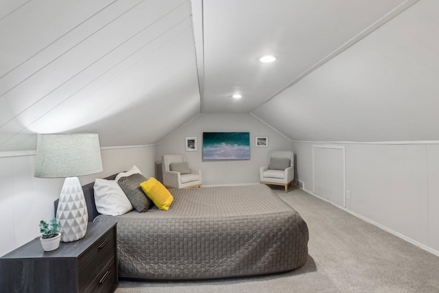 bedroom featuring carpet flooring, baseboards, and vaulted ceiling