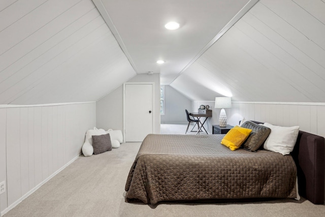 bedroom with baseboards, lofted ceiling, wooden walls, carpet flooring, and recessed lighting