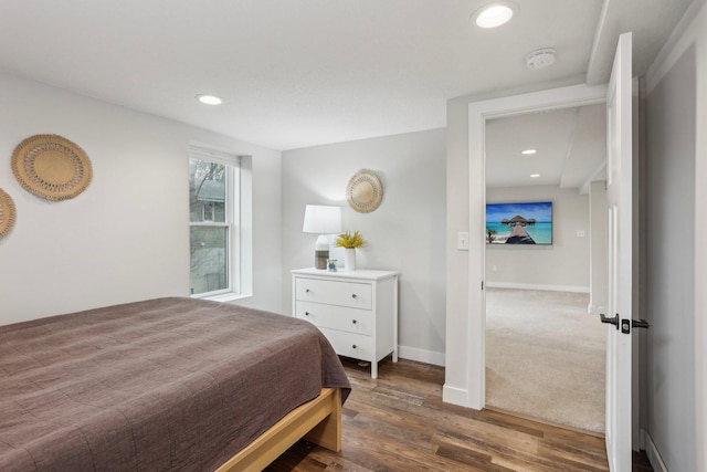 bedroom featuring recessed lighting, baseboards, and dark wood-style flooring