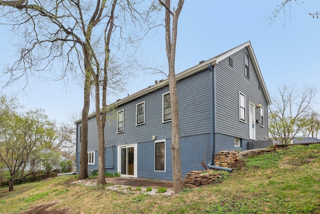 rear view of property featuring a patio area