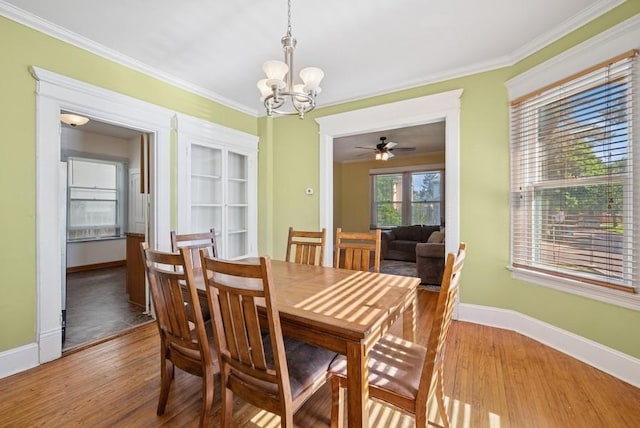 742 Laurel Ave, Saint Paul, MN 55104 - dining room with a chandelier, ornamental molding, and wood finished floors