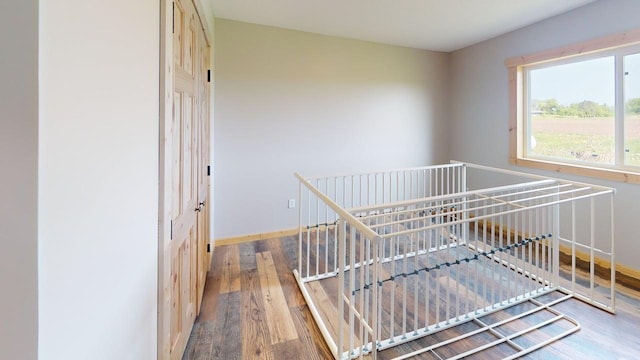 1950 228th Ln W, Mora, MN 55051 - stairs with wood finished floors and baseboards