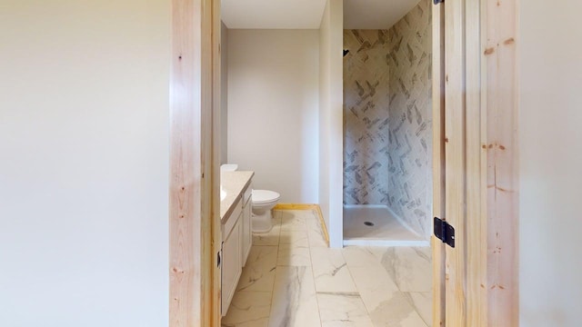 1950 228th Ln W, Mora, MN 55051 - full bathroom featuring vanity, a shower stall, toilet, and marble look tile flooring