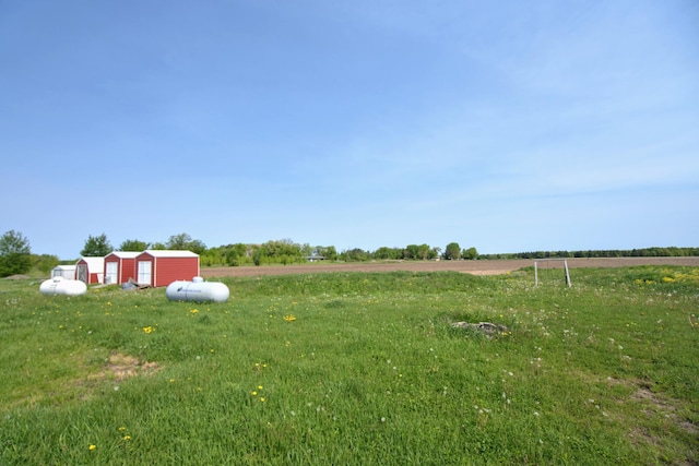 1950 228th Ln W, Mora, MN 55051 - view of yard featuring a rural view and a detached garage