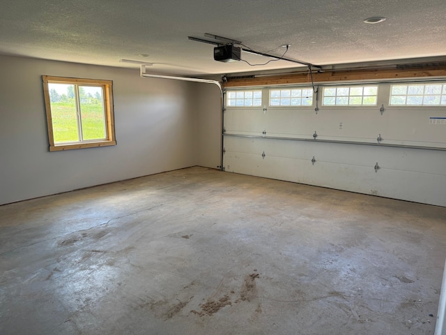 1950 228th Ln W, Mora, MN 55051 - garage featuring a garage door opener