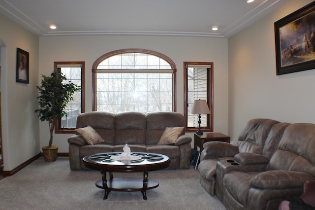 living room featuring carpet floors, recessed lighting, and a wealth of natural light