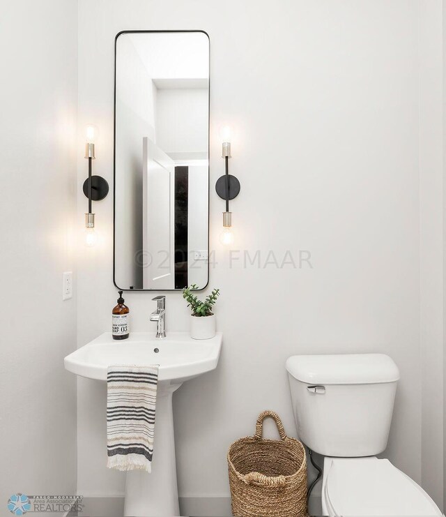 8851 Northern Lights Ave, Horace, ND 58047 - half bathroom with toilet