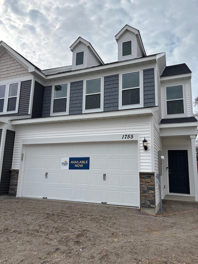 1755 Hauer Trl, Shakopee, MN 55379 - view of front facade featuring an attached garage and stone siding