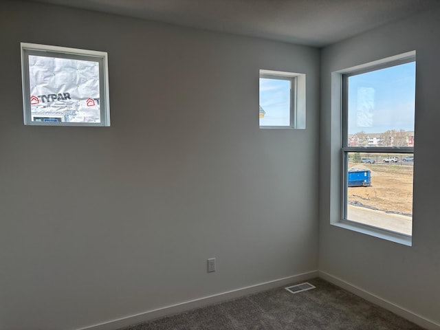 1755 Hauer Trl, Shakopee, MN 55379 - unfurnished room with dark carpet and baseboards