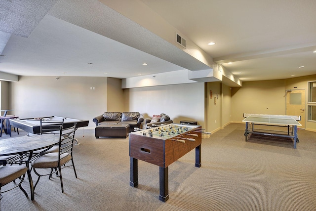 recreation room featuring baseboards, visible vents, carpet floors, and recessed lighting