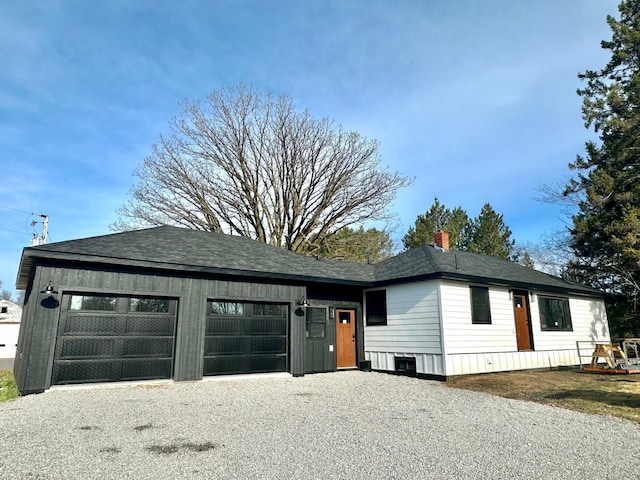 view of front facade with driveway and a garage